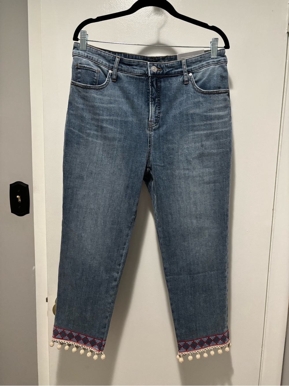 Chico's Mid-Blue Cropped Jeans with Embroidered Hem and Pom Trim